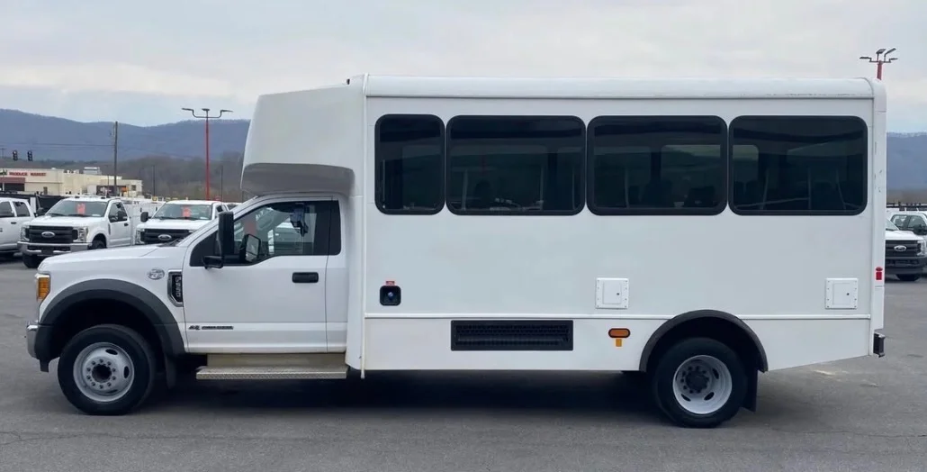 White Ford F-550 passenger shuttle bus
